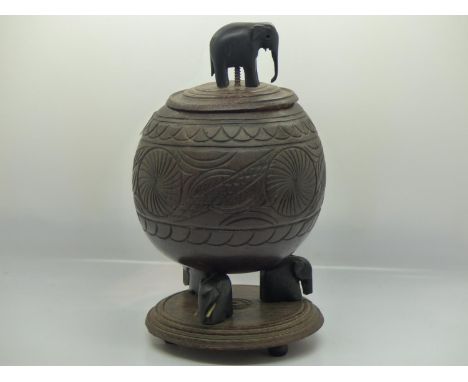 African carved coconut lidded pot, H: 22 cm. UK P&amp;P Group 2 (£20+VAT for the first lot and £4+VAT for subsequent lots) 