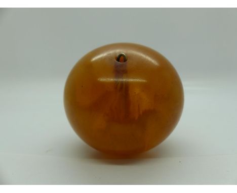 Large globular butterscotch amber pendant, H: 50 mm, few bumps, light scratches, no cracks or crazing. UK P&amp;P Group 0 (£6