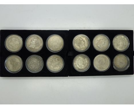 Twelve cased replica and fantasy crowns UK and world examples.  UK P&amp;P Group 1 (£16+VAT for the first lot and £2+VAT for 