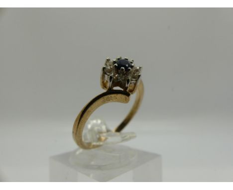 9ct gold cluster ring set with sapphire and cubic zirconia, size M, 1.9g. UK P&amp;P Group 0 (£6+VAT for the first lot and £1