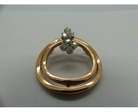 14ct rose gold circular pendant set with diamonds, D: 35 mm, 7.8g. UK P&amp;P Group 0 (£6+VAT for the first lot and £1+VAT fo