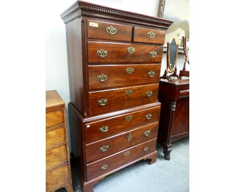 A GEO.III.MAHOGANY TALLBOY CHEST ON CHEST OF SIX LONG GRADUATED DRAWERS WITH PIERCED BRASS HANDLE BACK PLATES STANDING ON SHA
