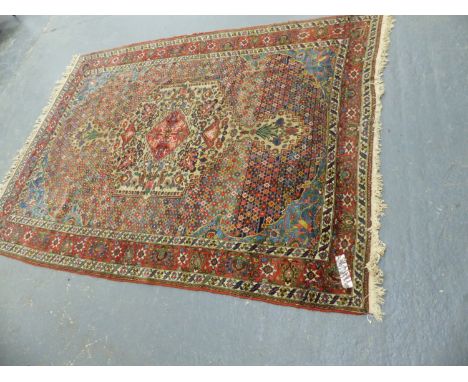 AN ANTIQUE PERSIAN BAKHTIARI CARPET.  306 x 212cms.