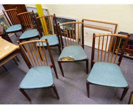 A SET OF SIX RETRO MID 20th C. ROSEWOOD CHAIRS, THE TOP RAILS AND STICK BACKS OF PALER WOOD, THE BACKS SLOPE TO BLUE UPHOLSTE
