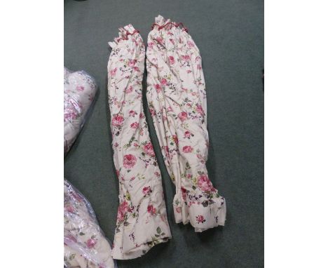 FOUR PAIRS OF ROSE PATTERNED LINED AND INTERLINED CURTAINS. 