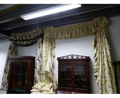 VARIOUS PAIRS OF CHINTZ LINED AND INTERLINED FLORAL PATTERN CURTAINS WITH RELATED HANGINGS AND CUSHIONS.