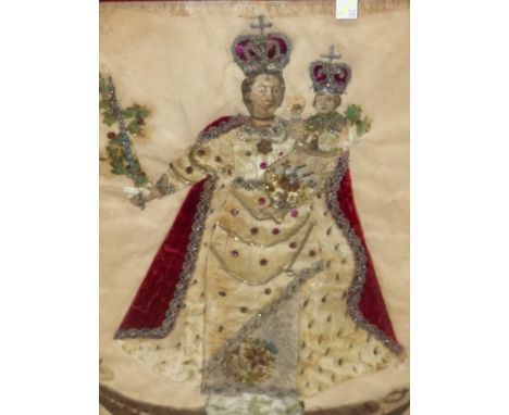 A GERMAN SEQUIN AND SILVER THREAD PICTURE OF SANCTA MARIA REGINA HOLDING THE CROWNED CHILD, HER RED CLOAK AGAINST THE WHITE S