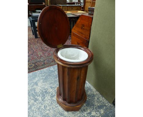 A VICTORIAN MAHOGANY CYLINDER FORM LIFT TOP BEDSIDE CABINET, WITH WASH BASIN.   Dia.42 x H.78cms.