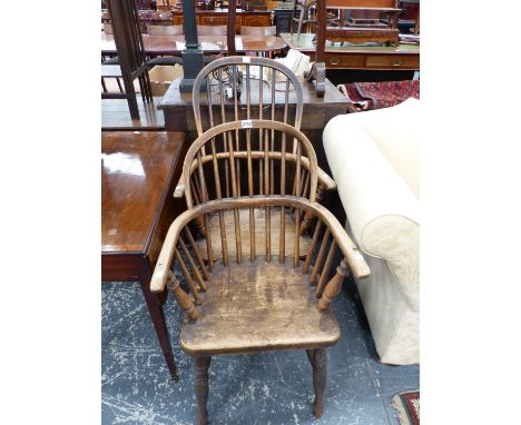 TWO OAK AND ELM WINDSOR CHAIRS WITH ROUND ARCH HOOPS SUPPORTING THE STICK BACKS AND FORMING THE ARMS ABOVE THE SEATS AND BALU