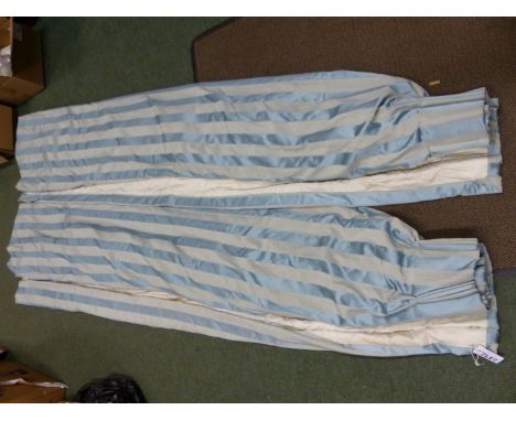 A PAIR OF PALE BLUE STRIPE PATTERN LINED AND INTERLINED CURTAINS. 