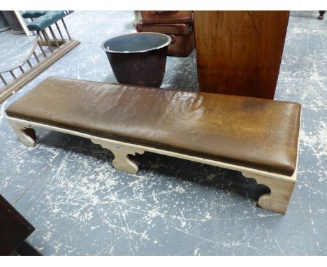 AN UNUSUAL BLEACHED ELM LEATHER SEAT HEARTH STOOL, HIGH BRACKET FEET. W. 160cms.