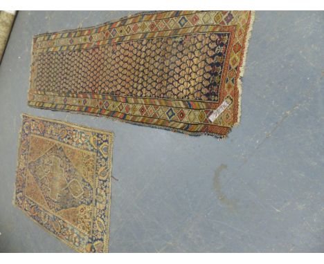 AN ANTIQUE PERSIAN SAROUK RUG, TOGETHER WITH AN ANTIQUE PERSIAN TRIBAL RUNNER  307 x 100cms (2).