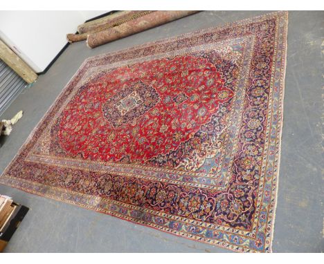 A PERSIAN KESHAN CARPET. 383 x 291 cm