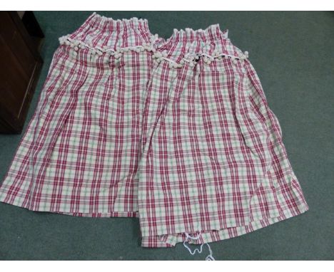 A PAIR OF CHECK PATTERN LINED AND INTERLINED CURTAINS, TOGETHER WITH A PAIR OF WINE RED AND GOLD PATTERNED LINED CURTAINS. 