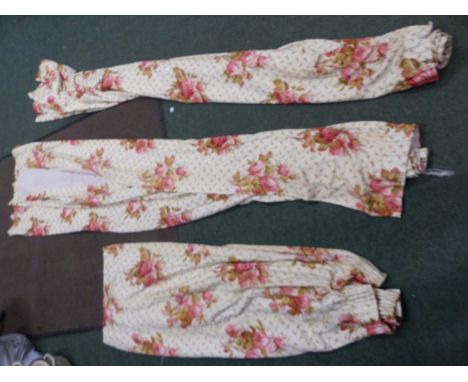 THREE VARIOUS PAIRS OF FLORAL PATTERN LINED AND INTERLINED CHINTZ CURTAINS.
