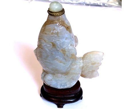 A CHINESE JADE OCTAGONAL PENDANT WITH CENTRAL ROTATABLE YING AND YANG BEAD.   W 4.5cms. A BRONZE BUDDHA.   H 3.5cms. AND A GR