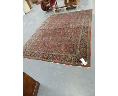 AN ANTIQUE PERSIAN KESHAN CARPET.  361 x 262cms.