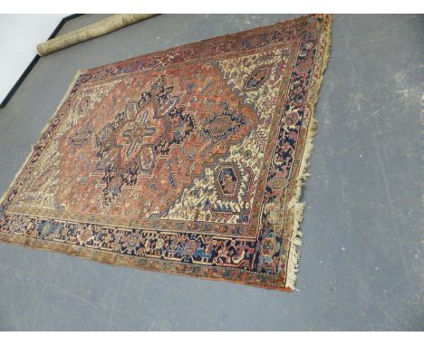 A PERSIAN HERIZ CARPET  338 x 234cms.