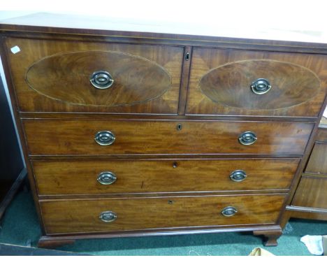 A REGENCY MAHOGANY SECRETAIRE CHEST WITH FITTED FALL FRONT UPPER DRAWER OVER THREE GRADUATED LONG DRAWERS STANDING ON OGEE BR