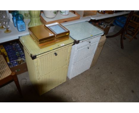 Two Lloyd loom bedside cabinets; and a linen basket 