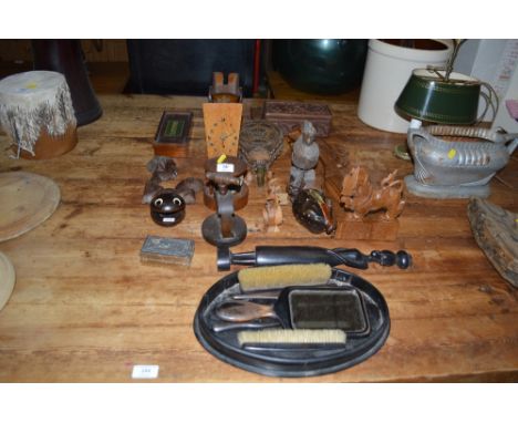 A quantity of various woodenware, to include figures a pair of bellows, trinket box etc.