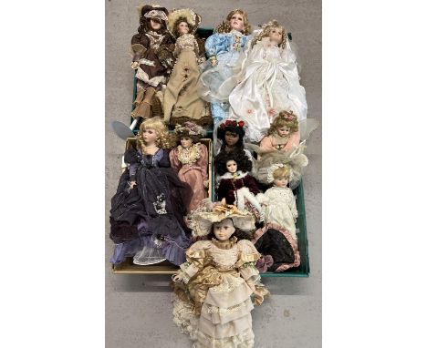 A collection of 14 large porcelain collectors dolls in period style dresses and hats. Some with stands to include a bride dol