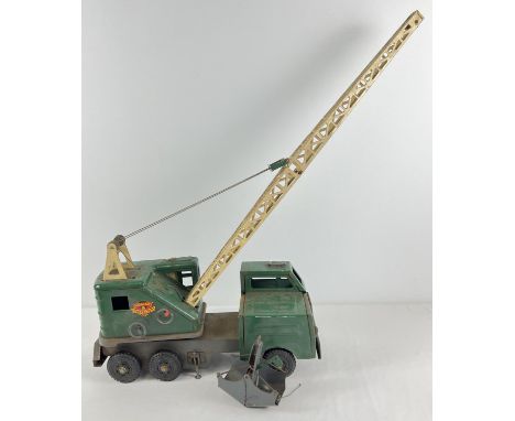 A green and cream vintage tin plate 6-wheel Marx and Co "Lumar Contractors" High Lift Mobile crane. With grab bucket and wrec