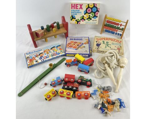 A box of assorted vintage toys and games. To include boxed The Magic Roundabout xylophone, Brio trains, wooden abacus and box