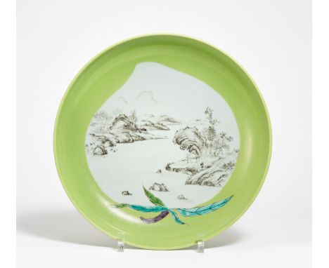 LARGE LANDSCAPE DISH.  China. Qing dynasty. 19th c.  Heavy porcelain with monochrome apple green glaze, blue and green enamel