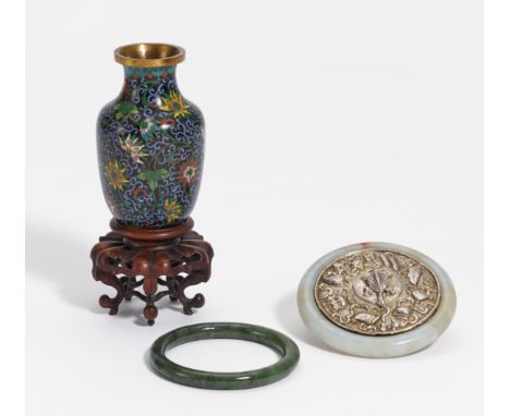 SMALL MIRROR, JADE ARM SPANGLE AND CLOISONNÉ VASE.  China. 19th-20th c. a) Mirror with silver back and framed by arm spangle 