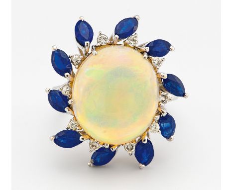 OPAL-SAPHIR-RING. 750/- Weißgold, Punze, Gesamtgewicht: ca. 10,5 g. EU-RM: 55. 10 kleine Diamanten Ø ca. 1,3 mm. 1 ovaler Opa