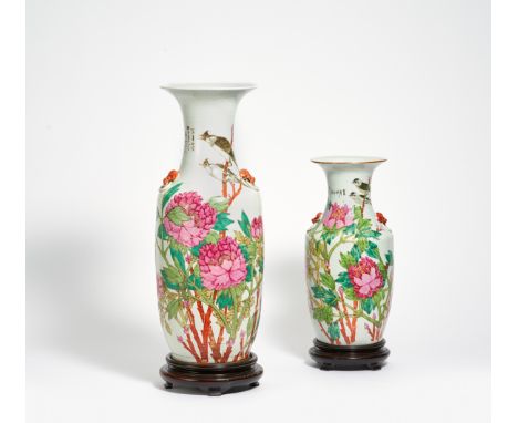 TWO VASES WITH CHINESE BULBULS IN SPLENDID PEONIES.  China. Beg. 20th c.  Porcelain famille rose. Handles in shape of lion he