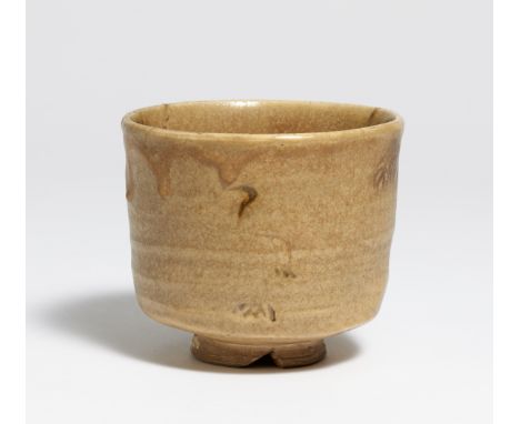KI SETO TEA BOWL (CHAWAN).  Japan. 17th-18th c.  Light-colored body, covered with greenish yellow, matte, crazed glaze. Partl