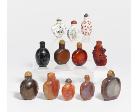 TWELVE SNUFFBOTTLE FROM STONE AND OTHER MATERIALS.  China. 19th-20th c.  Banded agate, bamboo, Canton enamel on copper, porce