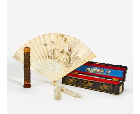 EMBROIDERED FAN WITH FINE IVORY CARVING. China. Qing dynasty. Ca. 1900. Bone: Outside carved in deep relief, the fan sticks i