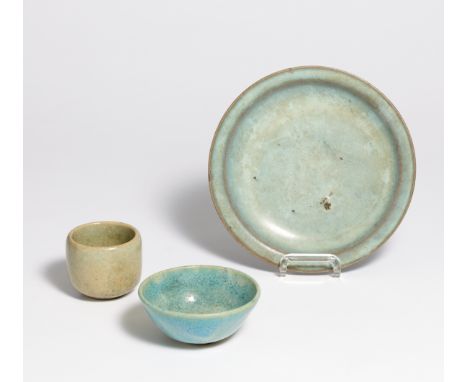 DISH AND CUP WITH JUNYAO GLAZE.  China. Song or Ming dynasty.  Light grey stoneware, covered with light blue Junyao glaze wit