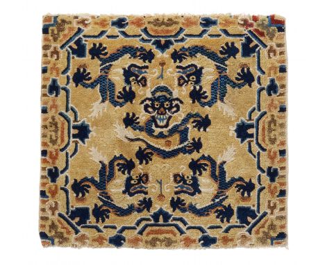 THRONE CARPET WITH FIVE DRAGONS ON YELLOW GROUND.  China. Ningxia. Qing dynasty (1644-1911). 18th/19th c.  Dyed wool, knotted