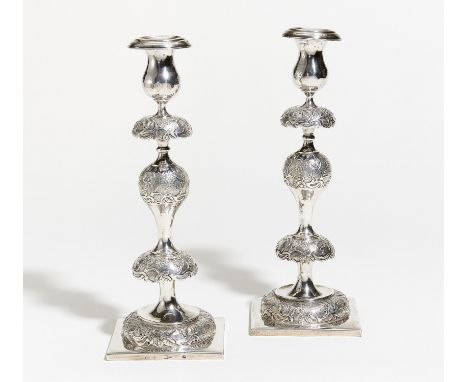 PAIR OF SILVER CANDELABRA WITH VINE DECOR.  Presumably Russia. 19th century.  Silver. Ca. 940g. Height each 35cm.  Marks most