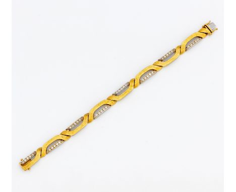 DIAMANT-ARMBAND. Deutschland. 585/- Gelb/- Weißgold, Punze, Gesamtgewicht: ca. 32,5 g. 18,0 cm. 35 kleine Brillanten zus. ca.