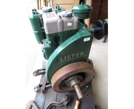 Lister stationary engine on four wheeled cart with two original starting handles, H25" 