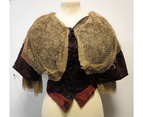 VICTORIAN DAY WEAR BLOUSE IN EMBOSSSED BURGUNDY SATIN, with puff ¾ sleeve and embroidered net inserts, the collar with a 'fis