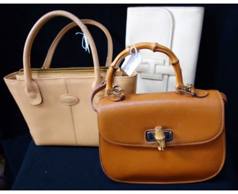 A CREAM LEATHER HANDBAG BY 'TODDS' and two other vintage handbags(3)