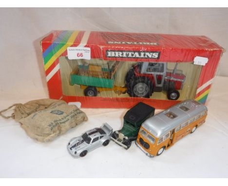 BRITAINS; A MASSEY FERGUSON TRACTOR with trailer (boxed) and similar vehicles