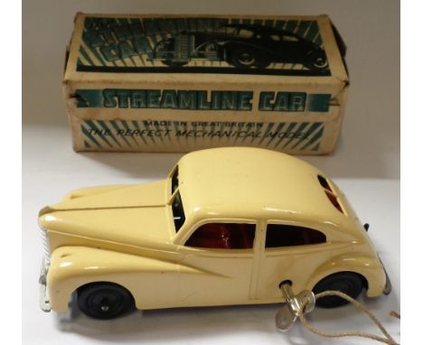 METTOY; "THE STREAMLINE CAR" a clockwork split-screen car with cream paint work, circa 1950's with original box