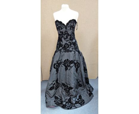 A VINTAGE LADIES BLACK EVENING DRESS, with applied velvet detail, circa 1950's