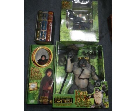 THE LORD OF THE RINGS AND FELLOWSHIP OF THE RINGS, a figure of Gandalf, Cave Troll and Frodo, (all boxed) and a set of DVDs