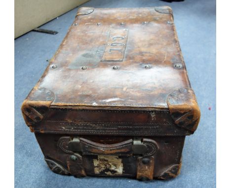 A VICTORIAN LEATHER TRUNK with the initials "CGL" and stamped "Solid leather"
