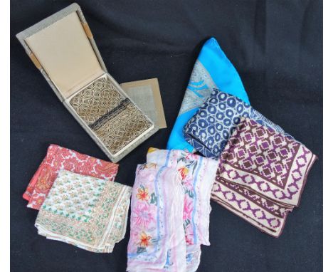 A VINTAGE BOXED LONG SILK SCARF BY BATIK WAYANG in black and cream with swirl design and a collection of other vintage scarve