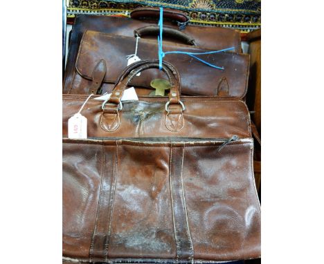 THREE BROWN LEATHER VINTAGE BRIEFCASES