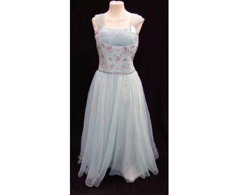 A VINTAGE LADIES GREEN EVENING GOWN with applied bead work decoration, circa 1960's